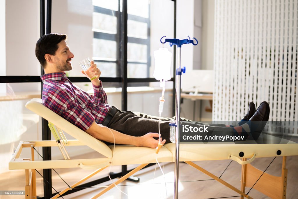 Vitamin Therapy IV Drip Infusion In Man Blood